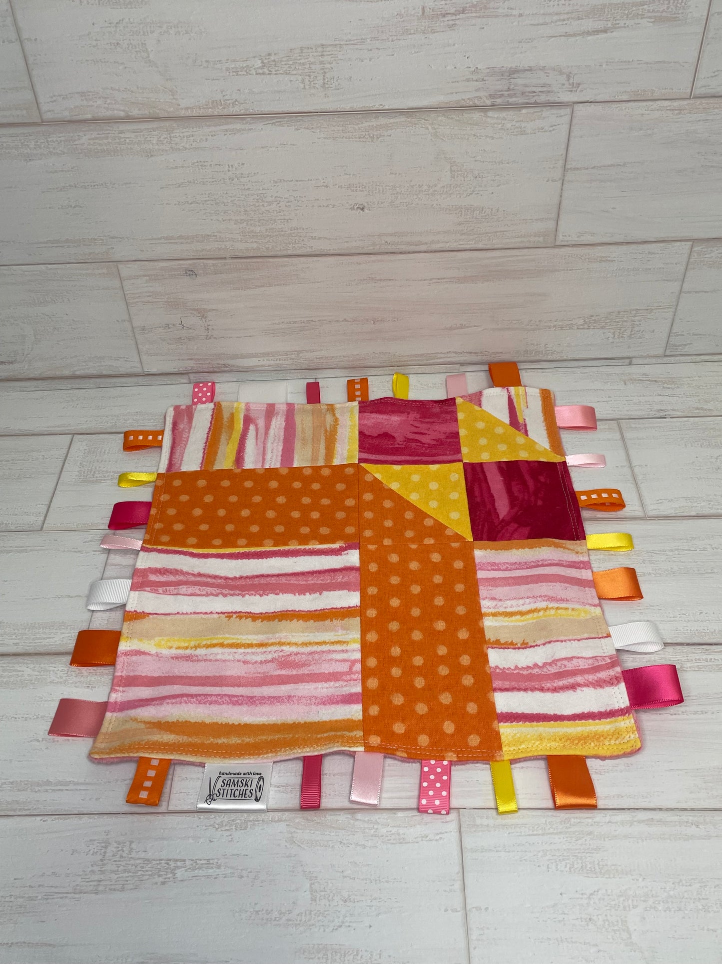 Pink Yellow Orange Tie-Die Quilted Sensory Taglet