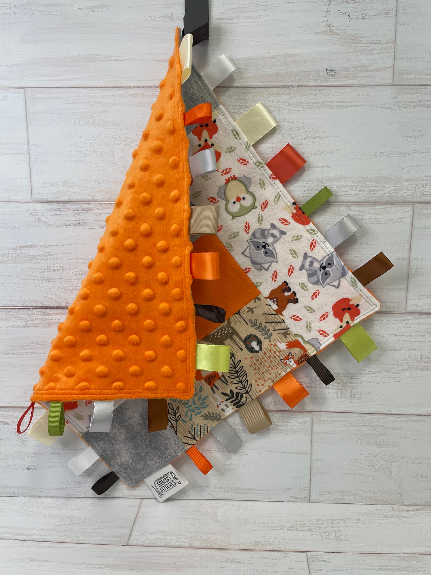 Woodlands Orange Grey Checkered Quilted Sensory Taglet