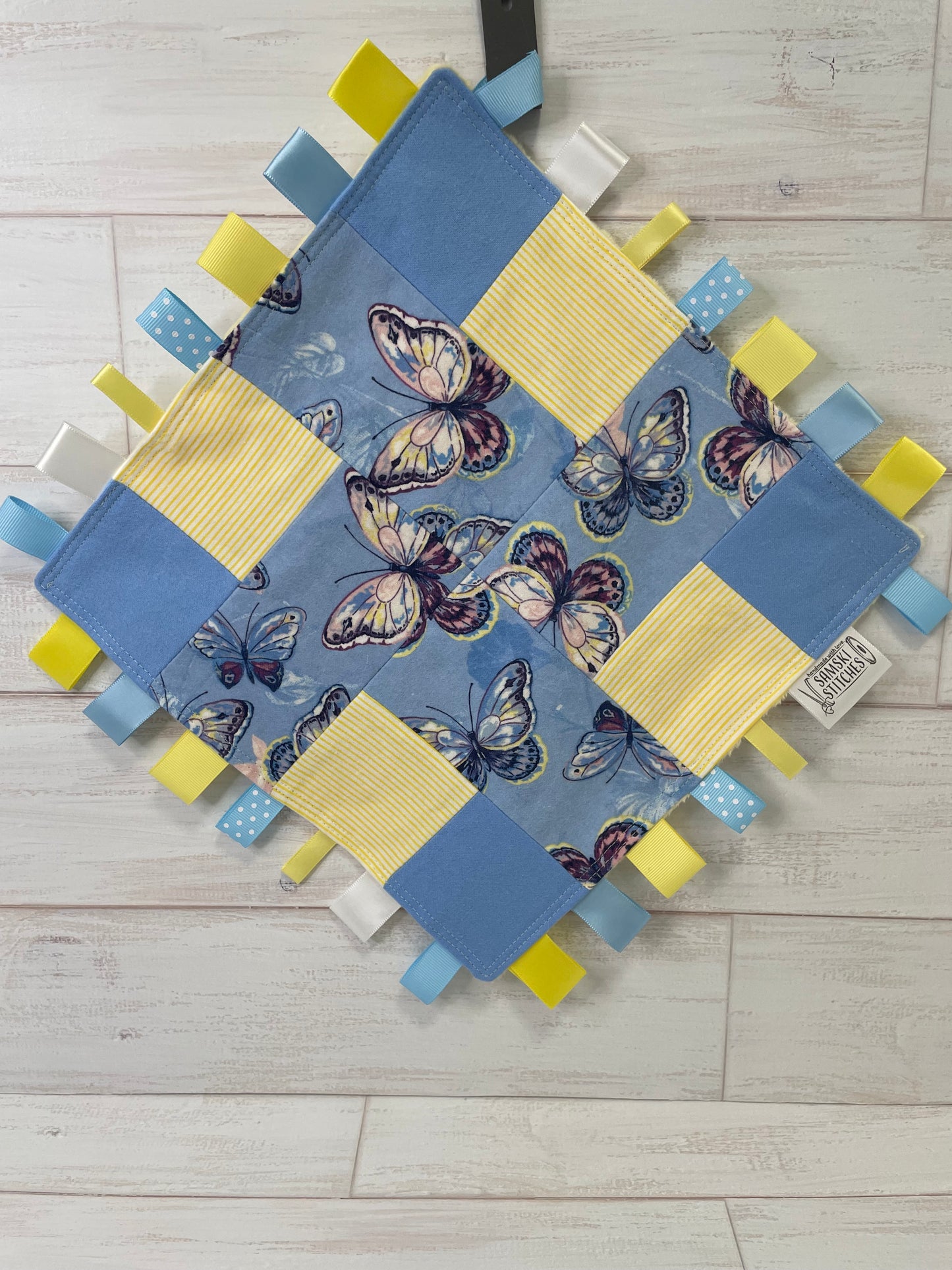 Butterflies on Light Blue with Yellow Accents Sensory Taglet