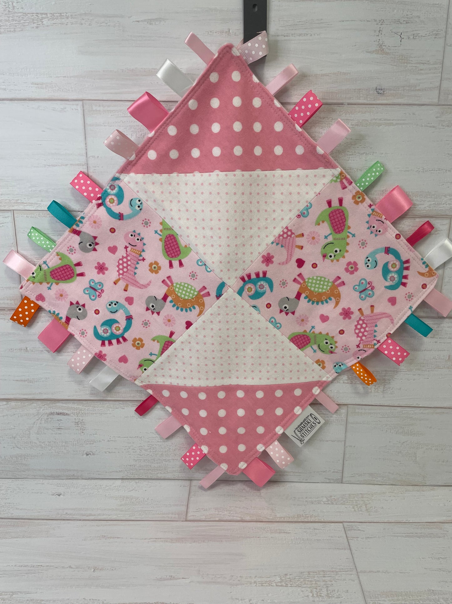 Dinosaurs on Pink with Multi Dots Sensory Taggie