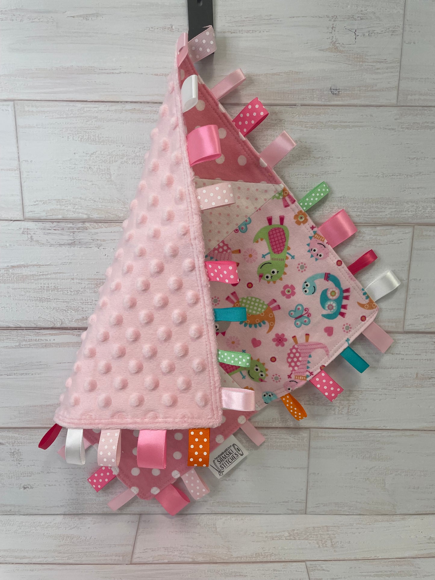 Dinosaurs on Pink with Multi Dots Sensory Taggie