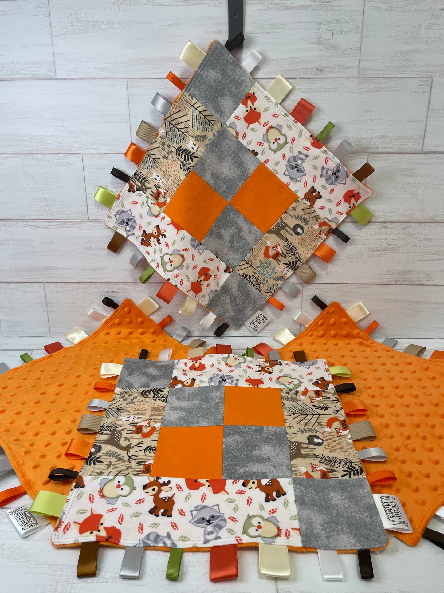 Woodlands Orange Grey Checkered Quilted Sensory Taglet