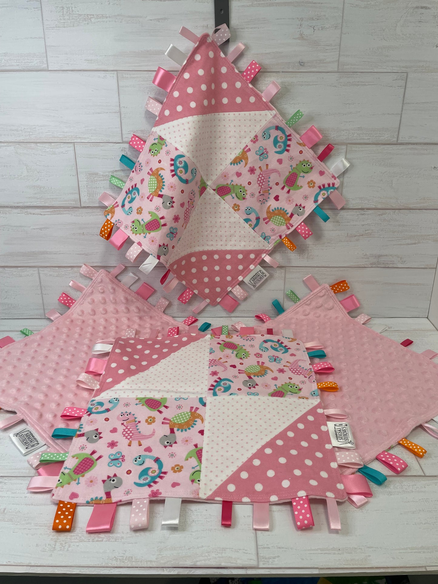 Dinosaurs on Pink with Multi Dots Sensory Taggie