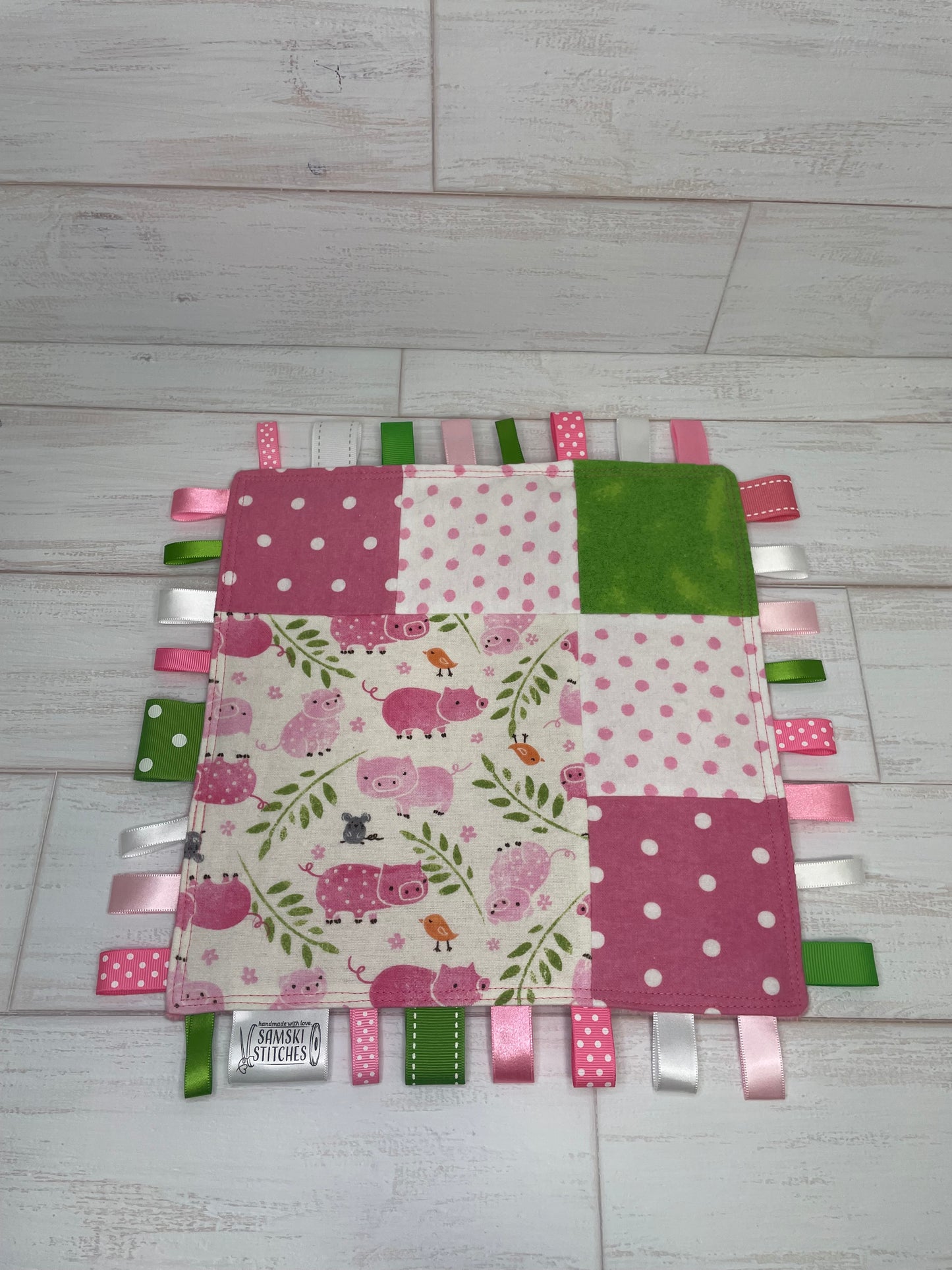 Pink Piggies with Multi Dots Sensory Taglet