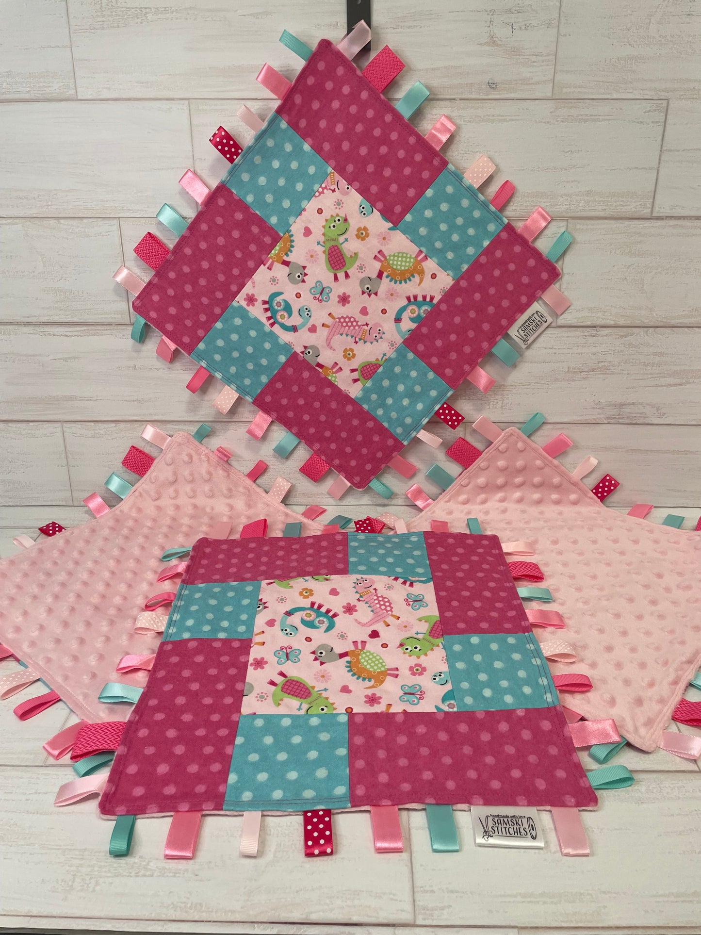 Dinosaurs with Aqua & Pink Dots Sensory Taglet