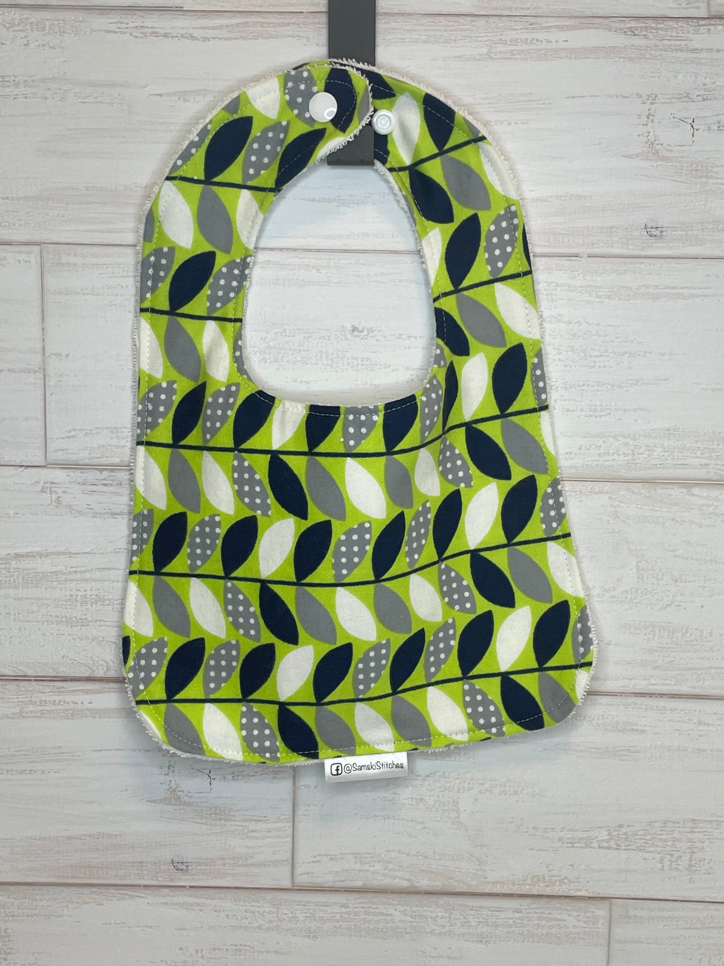 Green and Blue Abstract Themed Bibs