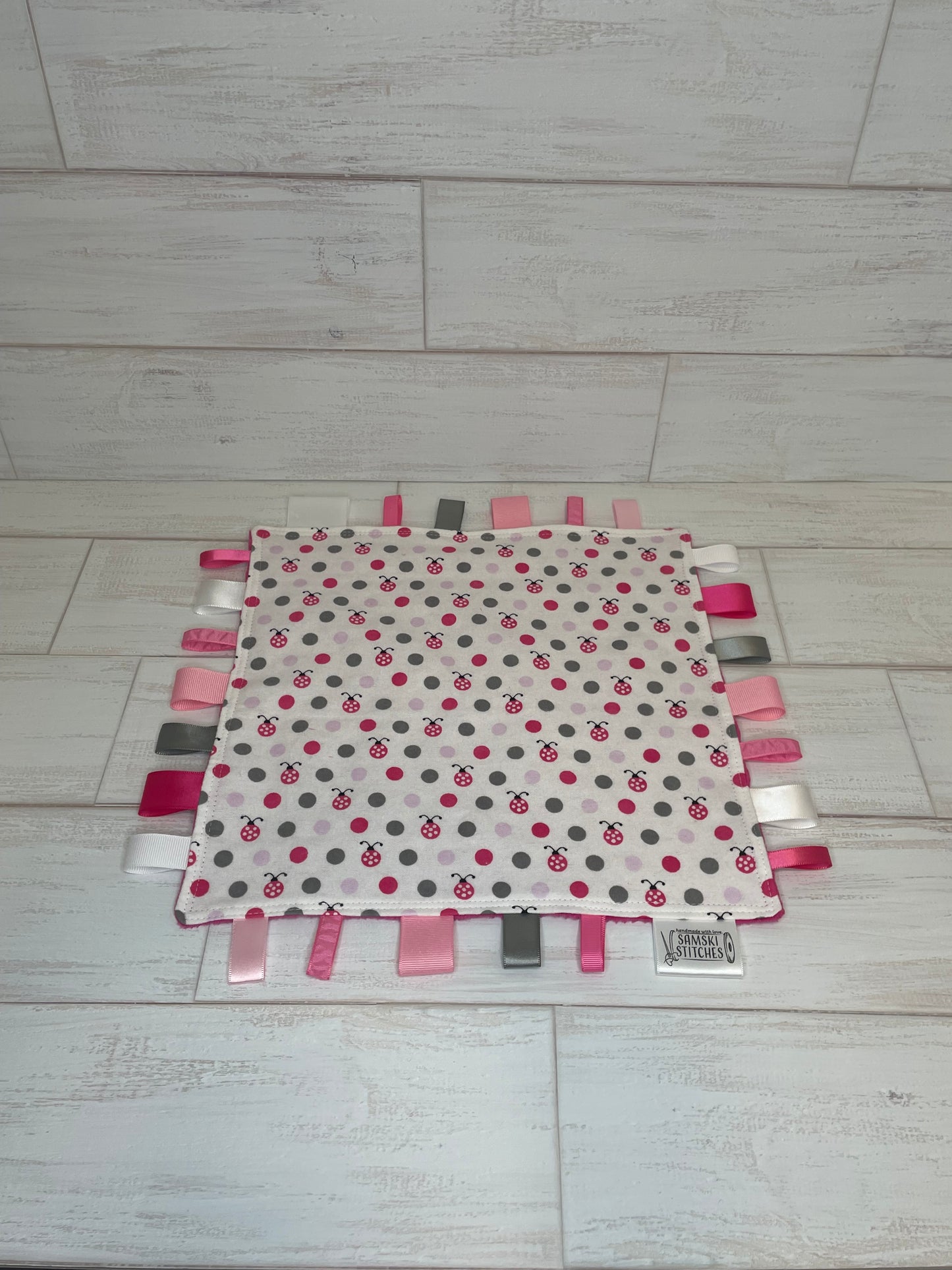 Pink Lady Bug Dots Sensory Taglet