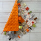Woodlands Orange Grey Checkered Quilted Sensory Taglet