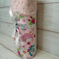 Dinosaurs on Pink with Stars Swaddle Blanket
